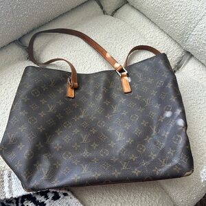 Damaged vintage Louis Vuitton bag